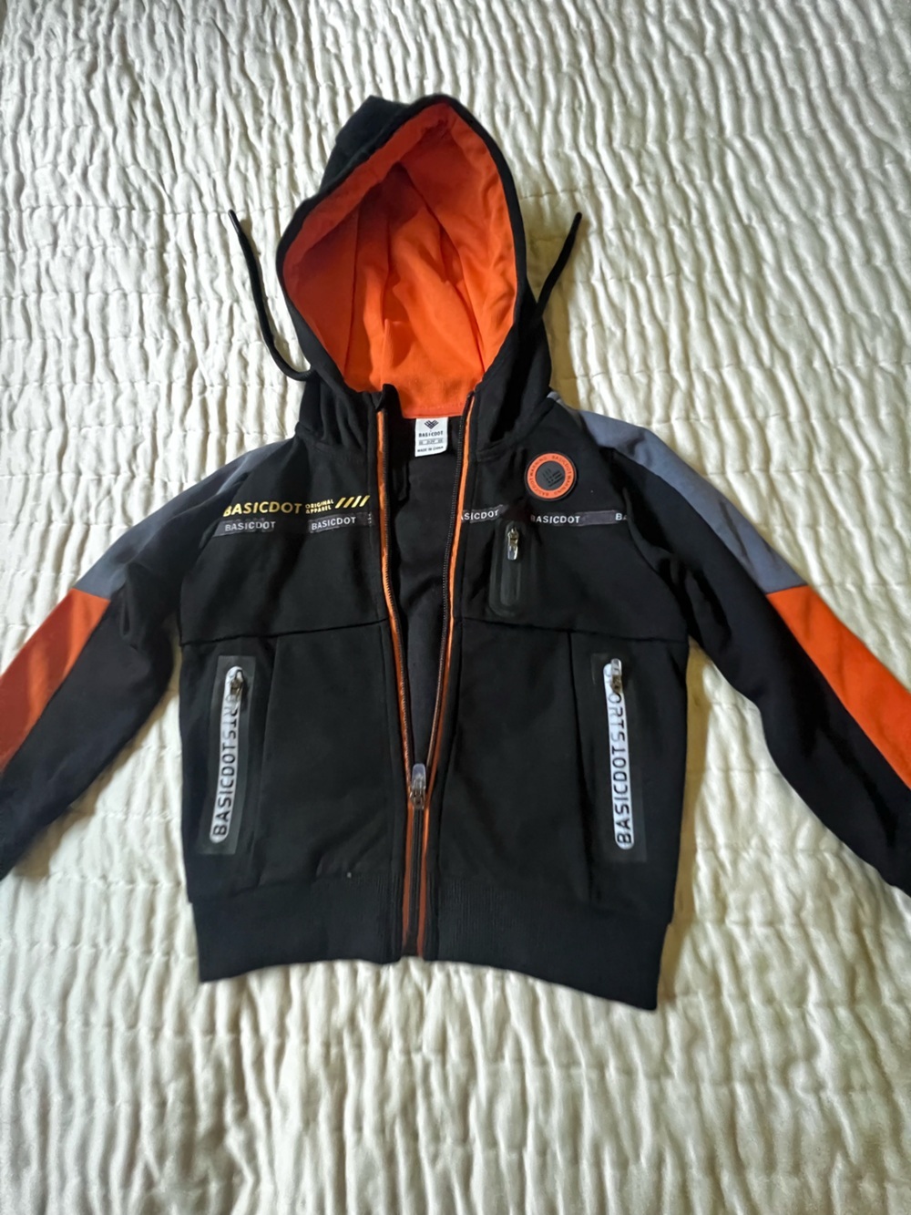 BasicDot Black & Orange Hooded Jacket.  Boys 2/3 yrs.  Ribbed  band at bottom
